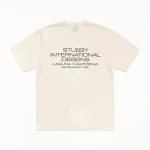 ステューシー インターナショナルデザインズ Tシャツ 顔料染めアイボリー